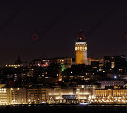 Illuminated Galata Tower in istanbul at night from Asia to Europe